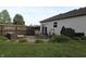 Backyard with a patio, outdoor seating, privacy fence, green grass and siding at 1461 Ripplewood Dr, Danville, IN 46122