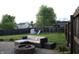 Inviting backyard features a patio with outdoor seating, fire pit, and play set at 1461 Ripplewood Dr, Danville, IN 46122