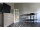 Inviting bedroom featuring a dresser, display case, and small work space, creating a comfortable and versatile living space at 1461 Ripplewood Dr, Danville, IN 46122