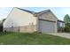 Charming single-Gathering home featuring a two-car garage and well-maintained lawn at 1461 Ripplewood Dr, Danville, IN 46122
