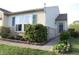 Well-maintained home with landscaped garden and covered front entryway at 1461 Ripplewood Dr, Danville, IN 46122