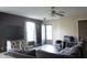 Cozy living area featuring a comfortable sofa, a large television, and ample natural light at 1461 Ripplewood Dr, Danville, IN 46122