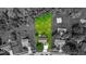 Aerial view of property lines that do not represent a survey showcasing a large lot surrounded by mature trees at 14814 Beacon Blvd, Carmel, IN 46032