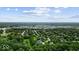 A scenic aerial view showcases the neighborhood's convenient proximity to major highways at 14814 Beacon Blvd, Carmel, IN 46032