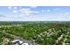 Overhead view of a community surrounded by lush trees and foliage and in close proximity to The Monon Trail at 14814 Beacon Blvd, Carmel, IN 46032