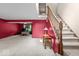 Basement area featuring a staircase and a recreation area with natural light at 14814 Beacon Blvd, Carmel, IN 46032
