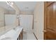 Clean bathroom featuring a double vanity, a shower/tub combo, and ample counter space at 14814 Beacon Blvd, Carmel, IN 46032