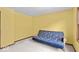 Bright bedroom with a futon and a large window at 14814 Beacon Blvd, Carmel, IN 46032