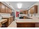 Spacious kitchen boasting ample wood cabinets, stainless steel appliances, and a convenient breakfast bar at 14814 Beacon Blvd, Carmel, IN 46032