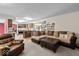 Inviting living room flowing into the kitchen with comfortable seating and a well-lit atmosphere at 14814 Beacon Blvd, Carmel, IN 46032