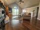 Spacious living room featuring vaulted ceilings, fireplace, and a large window at 1714 Michelle Mnr, Danville, IN 46122