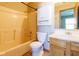 Bathroom featuring a vanity sink, toilet, shower and tub with functional and practical design at 18021 Sanibel Cir, Noblesville, IN 46062
