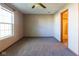Bedroom featuring neutral walls, plush carpeting, and a large window at 18021 Sanibel Cir, Noblesville, IN 46062