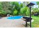 Enjoy summer days by the pool with a slide and BBQ area, ideal for outdoor gatherings and relaxation at 1829 Kessler Blvd W Dr, Indianapolis, IN 46228