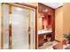 Bathroom featuring a glass shower, vanity with ample cabinet storage, and tile flooring at 186 W 600 N, Alexandria, IN 46001