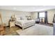 Serene bedroom with a bed, carpet, and a relaxing atmosphere with side tables and accent lighting at 186 W 600 N, Alexandria, IN 46001