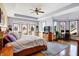 Spacious bedroom featuring a sitting area with large windows and a decorative tray ceiling at 186 W 600 N, Alexandria, IN 46001