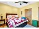 Classic bedroom with a queen bed, a ceiling fan, and neutral walls at 186 W 600 N, Alexandria, IN 46001