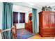 Bedroom featuring a dark wood dresser, armoire, and accents at 186 W 600 N, Alexandria, IN 46001