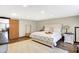 Spacious bedroom with light-colored walls, wood floors, and large area rug at 186 W 600 N, Alexandria, IN 46001