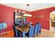 Elegant dining room with modern chandelier, hardwood floors, and stylish decor at 186 W 600 N, Alexandria, IN 46001