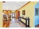 Bright hallway with tile flooring and a view into the kitchen at 186 W 600 N, Alexandria, IN 46001