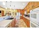 Bright kitchen featuring spacious countertops, oak cabinets, and modern appliances at 186 W 600 N, Alexandria, IN 46001