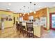 Spacious kitchen featuring a large island with seating, ample cabinet space, and modern appliances at 186 W 600 N, Alexandria, IN 46001