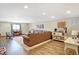 Spacious living room with a large sectional sofa and dining area, perfect for relaxing and entertaining at 186 W 600 N, Alexandria, IN 46001