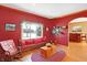 Comfortable sitting room with hardwood floors and a view into the kitchen at 186 W 600 N, Alexandria, IN 46001
