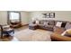 Comfortable living room featuring a sectional sofa, dining area, and stylish decor at 186 W 600 N, Alexandria, IN 46001