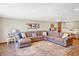 Inviting living room featuring a sectional sofa, dining area, and stylish decor elements at 186 W 600 N, Alexandria, IN 46001