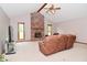 Inviting living room boasting a brick fireplace, vaulted ceiling, and comfortable furniture at 2090 W County Road 400 S, Clayton, IN 46118