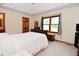 A main bedroom with a sleigh bed, en-suite bath and natural light at 2090 W County Road 400 S, Clayton, IN 46118