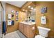A well-lit bathroom featuring a double sink vanity and modern fixtures at 3000 E County Road 400 N, Muncie, IN 47303