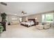 Large bedroom offers a spacious retreat with a seating area, large bed, and soft lighting at 3000 E County Road 400 N, Muncie, IN 47303