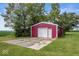 Exterior view of an outbuilding with a garage door at 3000 E County Road 400 N, Muncie, IN 47303