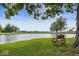 Scenic view of the pond with a charming bench overlooking the water at 3000 E County Road 400 N, Muncie, IN 47303