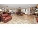 Large recreation room with a pool table, bar area, and walkout to backyard at 3000 E County Road 400 N, Muncie, IN 47303