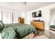 Main bedroom featuring hardwood floors, natural light, and ample closet space at 3047 N New Jersey St, Indianapolis, IN 46205