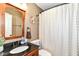 This bathroom features a modern vanity, mirror and fixtures at 3348 Fox Orchard Cir, Indianapolis, IN 46214