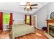 Serene main bedroom with vaulted ceilings, a fireplace, and ample natural light at 3348 Fox Orchard Cir, Indianapolis, IN 46214