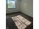 Bedroom bathed in sunlight, boasting neutral walls and soft carpeting at 3541 Alpine Pl, Indianapolis, IN 46226