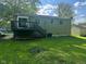 Home exterior with a backyard deck at 3541 Alpine Pl, Indianapolis, IN 46226