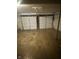 Spacious two-car garage with white doors and concrete flooring at 3541 Alpine Pl, Indianapolis, IN 46226