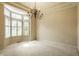 Bright, spacious dining room with large bay window and chandelier at 3556 Towne Dr, Carmel, IN 46032