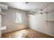 Bright room with hardwood flooring, a window, and shelving, offering lots of opportunity at 3556 Towne Dr, Carmel, IN 46032