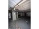Spacious unfinished basement shows the water heater and furnace at 3646 Creston Dr, Indianapolis, IN 46222