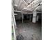 Unfinished basement featuring concrete floors, exposed piping and wooden beams on ceiling at 3646 Creston Dr, Indianapolis, IN 46222