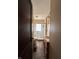 View into bathroom shows glass block shower, toilet and vanity at 3646 Creston Dr, Indianapolis, IN 46222